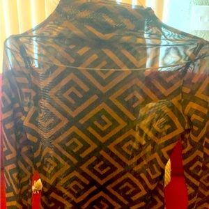 Very much new   Mesh lace see thru   Long sleeve